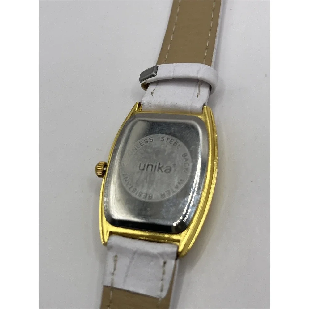 Unika Women's Quartz Watch Gold Tone Case White‎ Leather Band- New Battery
